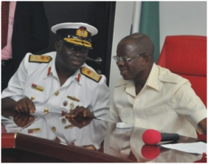 Admiral Samuel Alade, Commandant, National Defence College (left) and Governor Adams Oshiomhole during a visit of participants of the National Defence College, Course 24 to the Governor in his office.